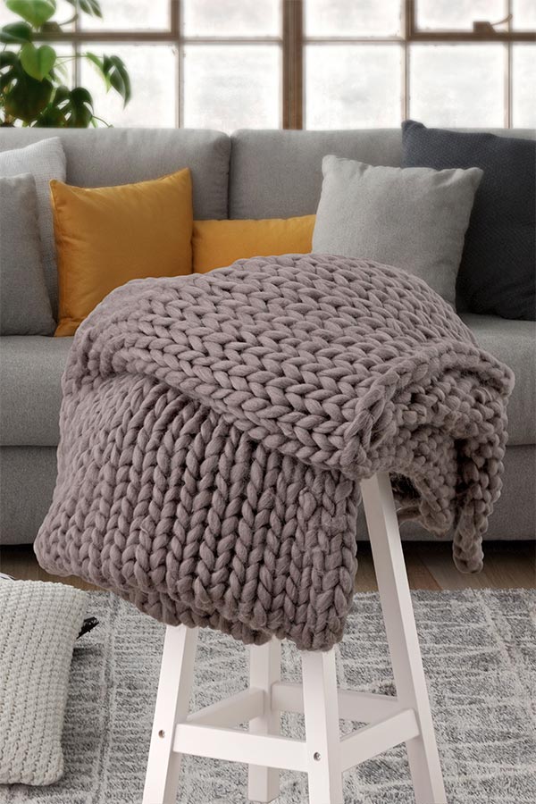 Los tejidos naturales no pueden faltar en estancias ambientadas en el estilo boho decoración boho