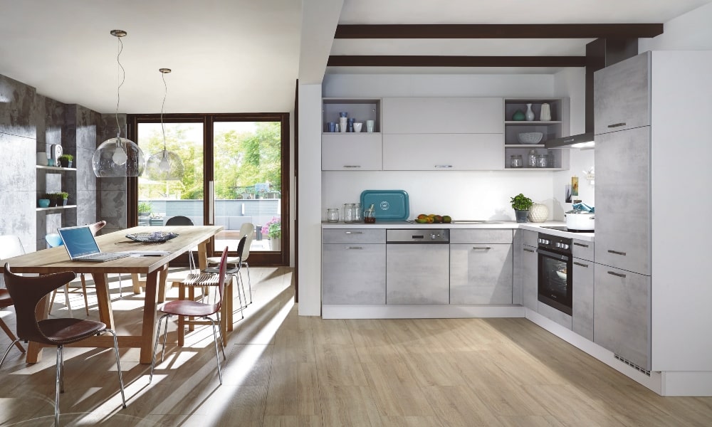 Cocina premium MONTANA. Cocina en L de líneas depuradas. aprovechar esquina cocina con cocina a medida